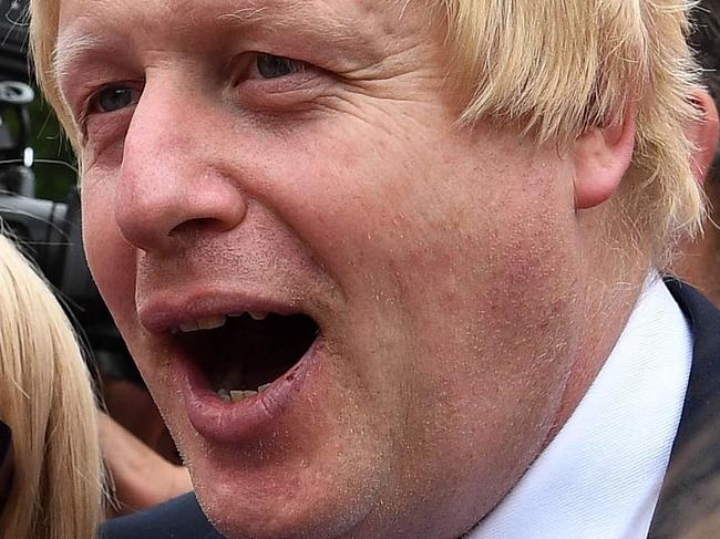 FILE In this Wednesday, June 22, 2016 file photo, advocate to exit Europe Boris Johnson poses for a selfie photo with voters during a whistle stop tour of the country on the final day of campaigning before Thursday's EU referendum vote, in Selby, north England. (Andrew Parsons / PA via AP, File) UNITED KINGDOM OUT - NO SALES - NO ARCHIVES