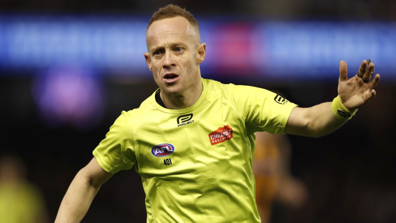 MELBOURNE, AUSTRALIA - JUNE 14: AFL Field Umpire Ray Chamberlain in action for his 300th game during the 2019 AFL round 13 match between the Essendon Bombers and the Hawthorn Hawks at Marvel Stadium on June 14, 2019 in Melbourne, Australia. (Photo by Dylan Burns/AFL Photos via Getty Images)