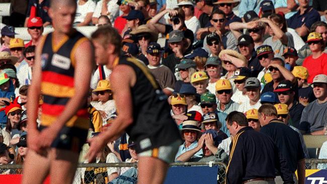 Malcolm Blight and John Reid leave the ground early as the Crows crumble to Richmond in 1998.  Picture: Sarah Reed