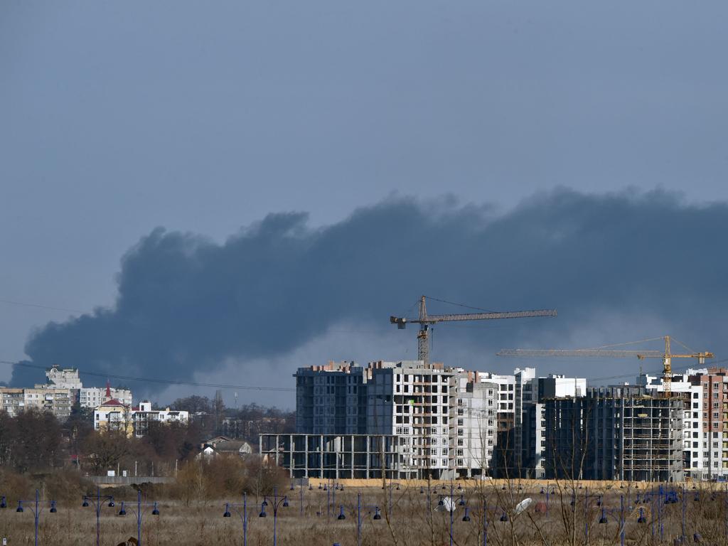 Smoke rising over Irpin, north of Kyiv as Russian forces step up the pressure. Picture: Sergei Supinsky/ AFP