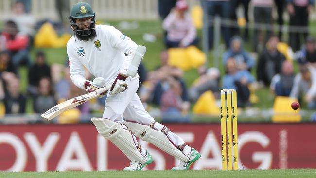 South African star batsman Hashim Amla in action at Blundstone Arena on Saturday. It is understood Amla was the subject of an offensive message written on a fence at the cricket ground. Picture: LUKE BOWDEN