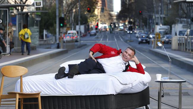 Major Nottle with furniture donated to the Salvos homeless service Project 614. Picture: David Caird