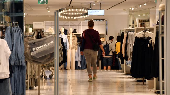 A shopper walks into a women's fashion store in Pitt Street Mall in Sydney. Picture: AAP 