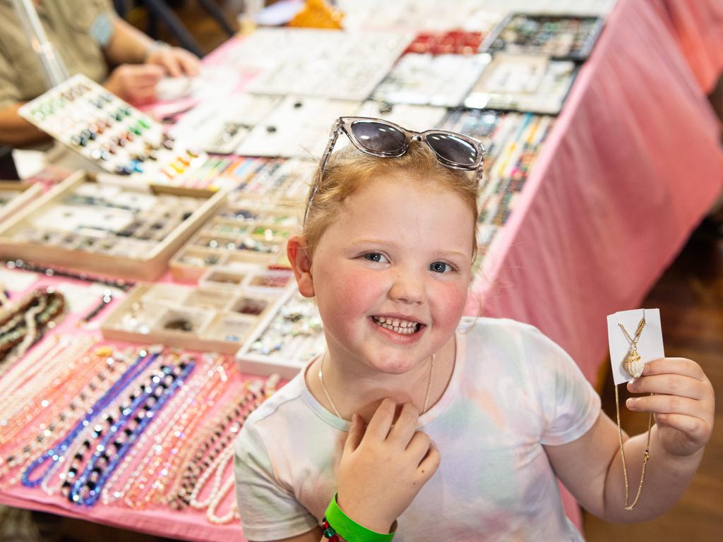 Aaliyah Watt with her shell pendant won as a lucky door prize at Gemfest hosted by Toowoomba Lapidary Club at Centenary Heights State High School, Saturday, October 19, 2024. Picture: Kevin Farmer