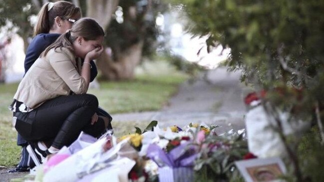 Friends pay their respects in July 2018.