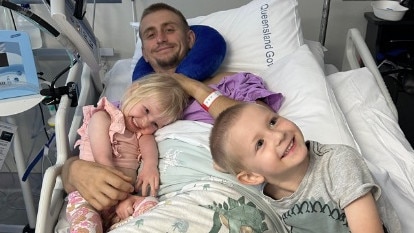 Mr Summerall with his children at the hospital after the accident. Picture: Jodie Summerall