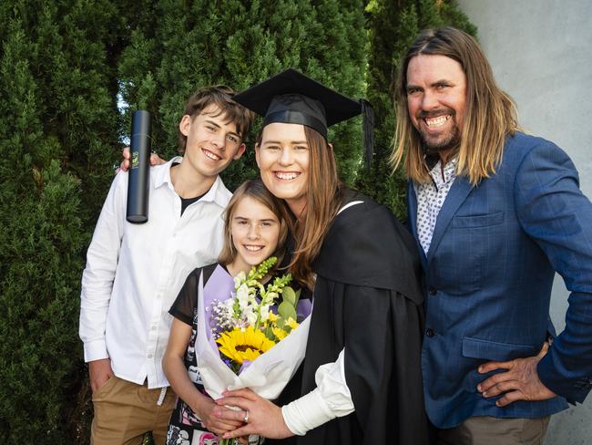 South Burnett Regional Council Cr Kirstie Schumacher celebrates her Bachelor of Communication and Media with son Decklan, daughter Grace and husband Wayne Schumacher at a UniSQ graduation ceremony at Empire Theatres, Tuesday, June 27, 2023. Picture: Kevin Farmer