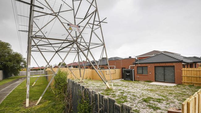 Neighbours are shocked by the unit being built metres from the electrical tower. Picture: Valeriu Campan