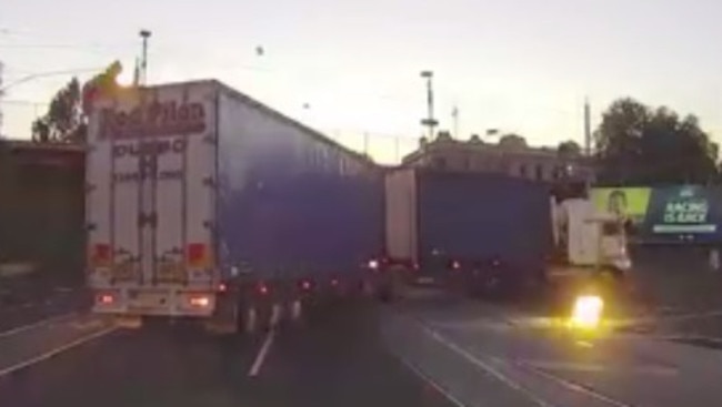 A truck brings down tram lines on Racecourse Rd, Flemington in February. Picture: Dashcam Owners Australia Facebook