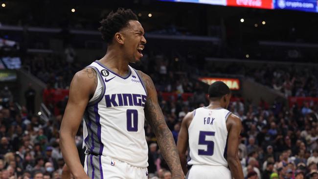 LOS ANGELES, CALIFORNIA - FEBRUARY 24: Malik Monk #0 of the Sacramento Kings reacts to his basket during a 176-175 double overtime Kings win over the LA Clippers at Crypto.com Arena on February 24, 2023 in Los Angeles, California. User is consenting to the terms and conditions of the Getty Images License Agreement.   Harry How/Getty Images/AFP (Photo by Harry How / GETTY IMAGES NORTH AMERICA / Getty Images via AFP)
