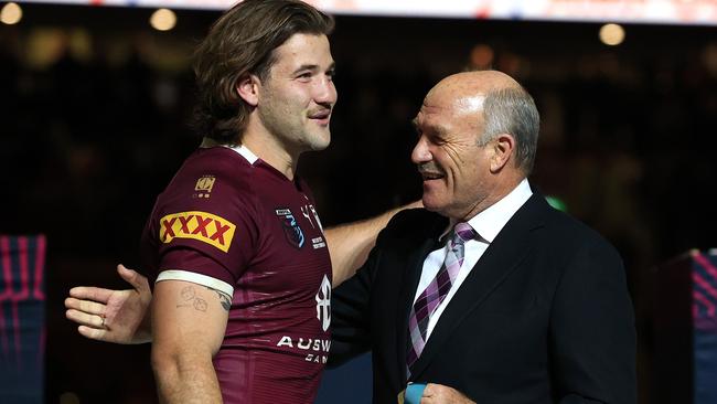 Lewis awards Pat Carrigan the Wally Lewis Medal. Photo: Adam Head