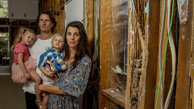 Gold Coast young homebuyers Sera and Shaun Sarson with daughter Aisla, 3, and son Rio, 2. Their newly purchased property in Elanoa was infested with termites and now it’s likely it has to be demolished. Photo: Jerad Williams.