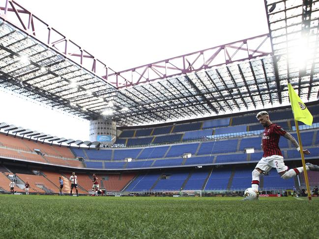 AC Milan’s Samu Castillejo kicking from the corner in an empty stadium during the Serie A soccer match between AC Milan and Genoa at the San Siro stadium in Milan, Italy. Picture: Spada/LaPresse via AP