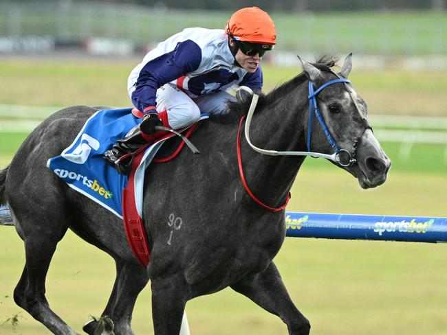 MELBOURNE, AUSTRALIA - APRIL 21: Craig Williams riding Figlio  D'Argento winning Race 3 during Melbourne Racing at Sandown Racecourse on April 21, 2025 in Melbourne, Australia. (Photo by Vince Caligiuri/Getty Images)