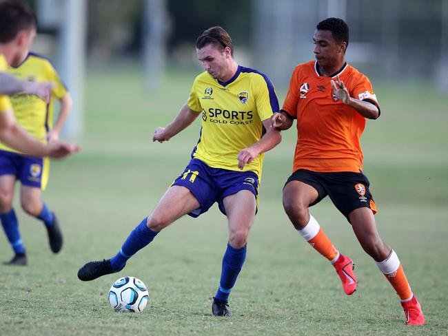 Curtis Stollery (left) in action for Gold Coast United last season. Picture: Richard Gosling