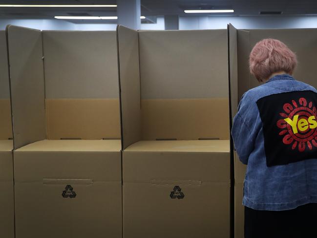 SYDNEY, AUSTRALIA - OCTOBER 09: A member of the public casts an early vote at a polling centre in the central business district on October 09, 2023 in Sydney, Australia. A referendum for Australians to decide on an indigenous voice to parliament will be held on October 14, 2023 and compels all Australians to vote by law. Early voting began on Oct. 2, with voting getting underway in all states. (Photo by Lisa Maree Williams/Getty Images)