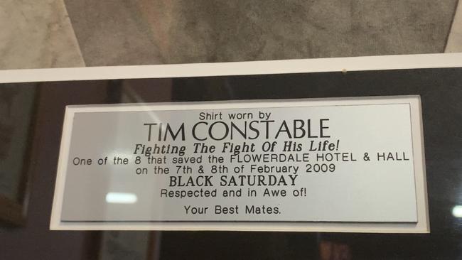 The framed, ash-stained shirt worn by local man Tim Constable as he fought to save the Flowerdale Hotel on February 7 and 8, 2009, hangs proudly in the bar. Picture: Kirra Grimes