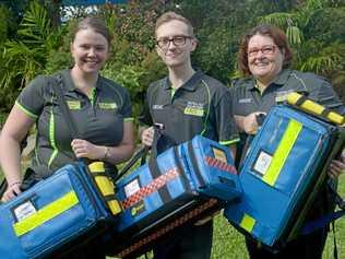 HERE TO HELP: Volunteer first aid officers Olivia Turner and Mitchell Kelly with Suzanne Messmer, Recruiting Officer. Picture: Jann Houley