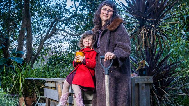 Sophia Hayes and daughter Lindsay, 3, in their garden where they grow their own vegetables. Picture: Jake Nowakowski
