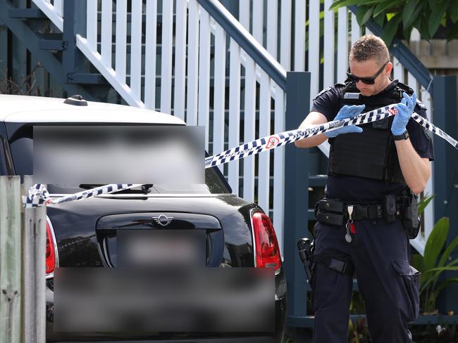 Police at the crime scene at Edith street in Deagon where a firearm was discharged during a midnight home invasion. Picture Lachie Millard