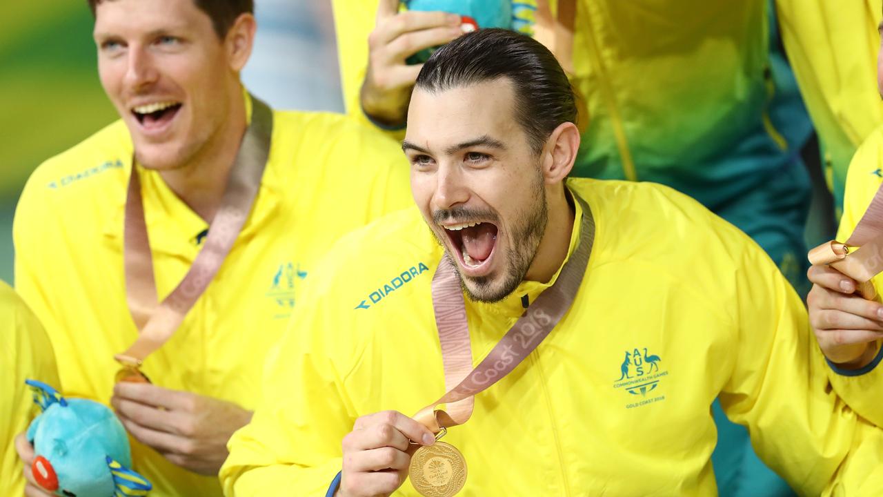 Australia guard/forward Chris Goulding (4) celebrates winning gold.