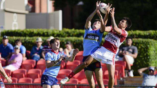 Ethan Brose of Western Clydesdales and Logan Hudson (right) of Brisbane Dolphins compete for possession in Mal Meninga Cup round 2 Queensland Rugby League at Toowoomba Sports Ground, Saturday, February 22, 2025. Picture: Kevin Farmer