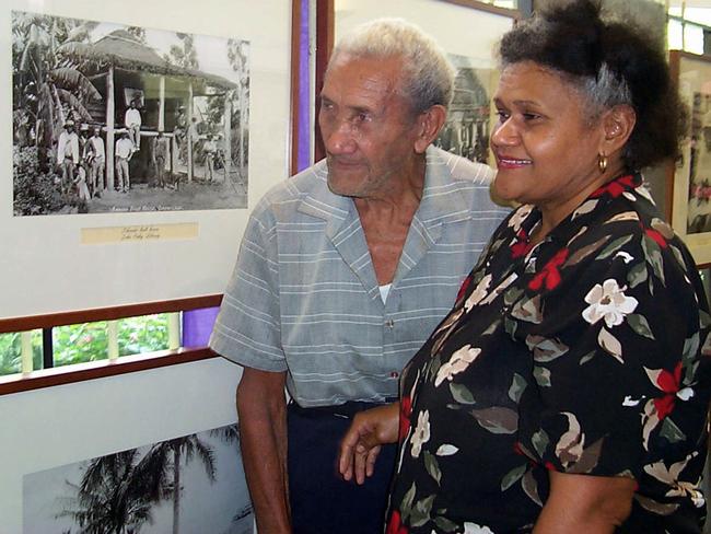 Stephen Andrew’s grandfather Cedric – then aged 89 with daughter Christine Andrew at an exhibition of South Sea Islander history in Australia. Picture: Daryl Wright