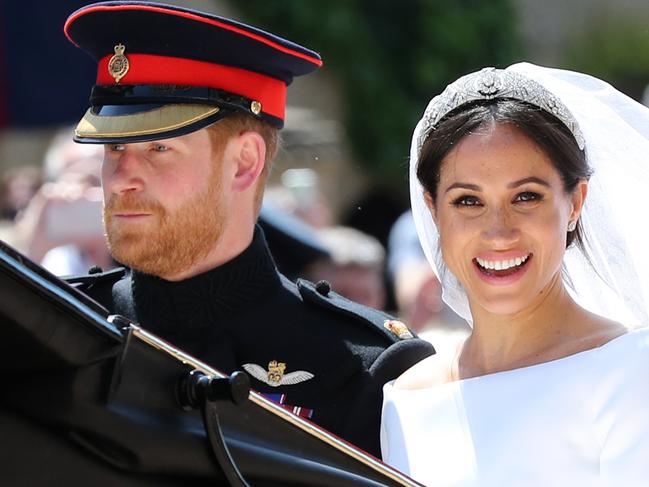 May 19, 2018 Britain's Prince Harry, Duke of Sussex and his wife Meghan, Duchess of Sussex begin their carriage procession after their wedding ceremony. Picture: AFP