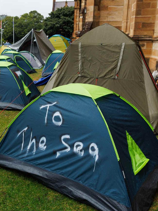 Tents with graffiti saying free Gaza and from the river to the sea. Picture: NCA NewsWire / David Swift