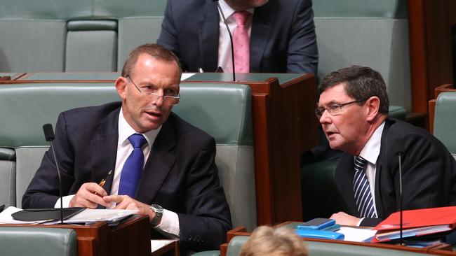 Kevin Andrews with former PM Tony Abbot during Question Time. Picture Kym Smith