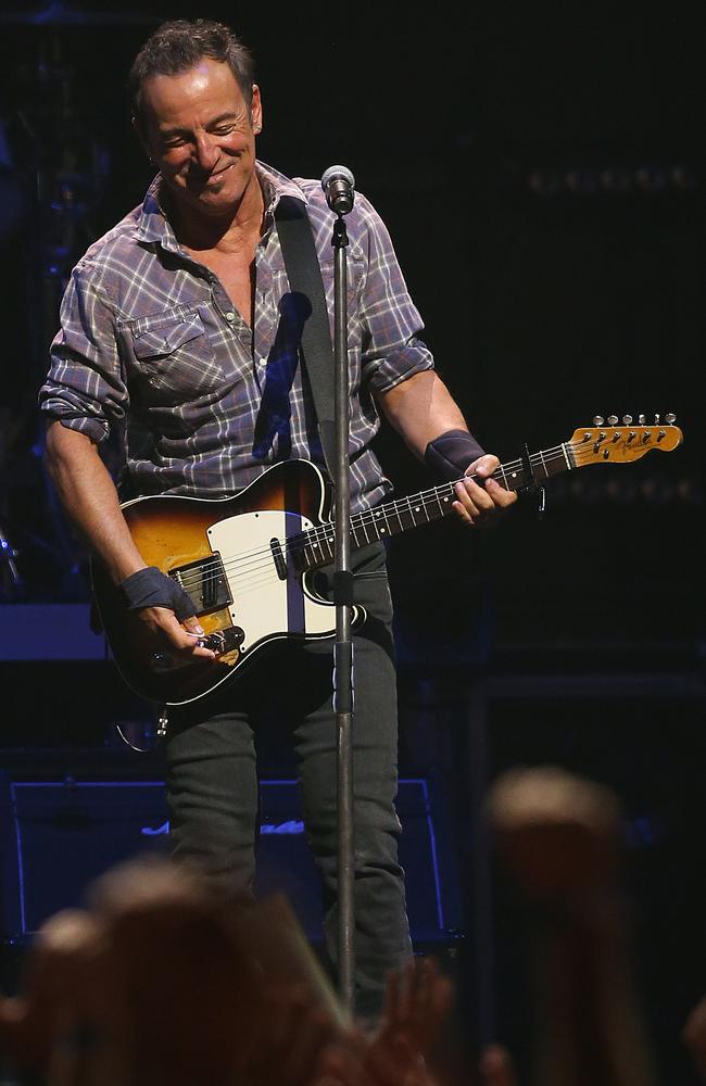 Bruce Springsteen woos the crowd at the Brisbane Entertainment Centre last night. Picture: Marc Robertson