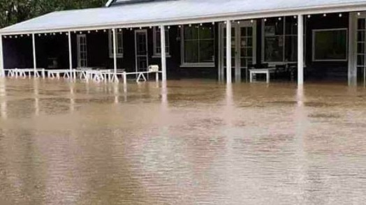 Woolooga woman Caz Crane said water inundated her and husband Matthew’s businesses in the January deluge. Photo: GoFundMe