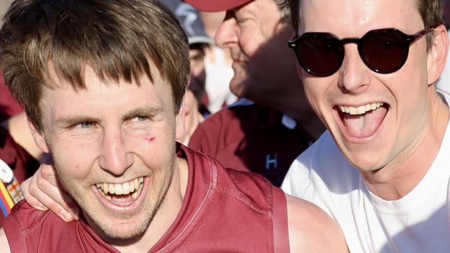 Prince Alfred OC playing-coach Craig Pitt celebrates the club's 2023 flag. Picture: Ann Marie O'Connor