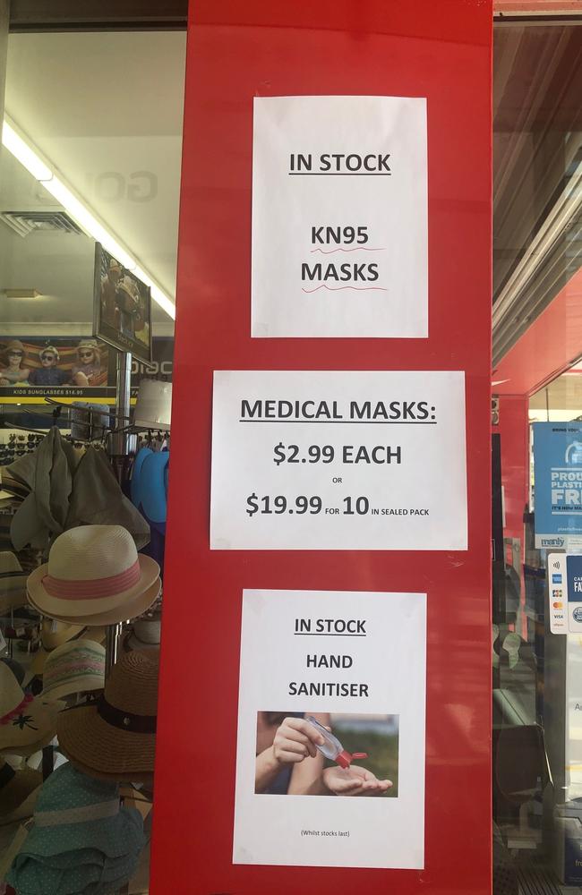 A sign of the times. Notices advertising COVID-19 protection products at Manly StarChem Pharmacy in The Corso. Picture: Julie Cross