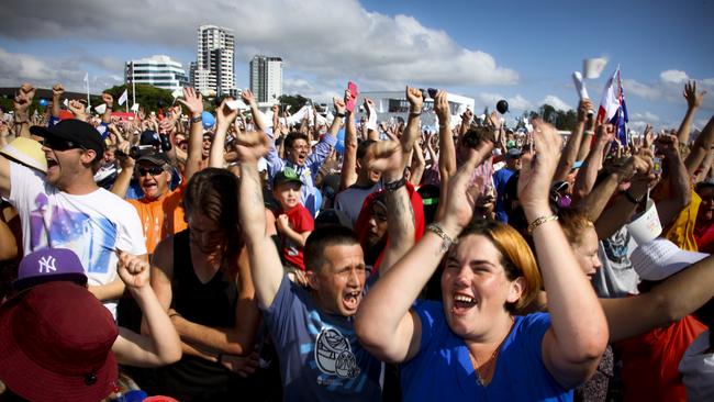 People leapt in celebration following the announcement of the Gold Coast's winning bid for the 2018 Commonwealth Games, Saturday, Nov. 12, 2011. (AAP Image/Patrick Hamilton)