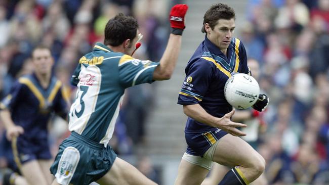 Shane Crawford, pursued by Tadgh Kennelly, helped the Aussies run over the top of Ireland.