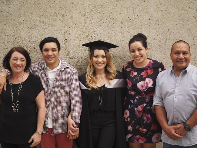 Julie and John Tam with their children Joshua, Emily and Dominque.