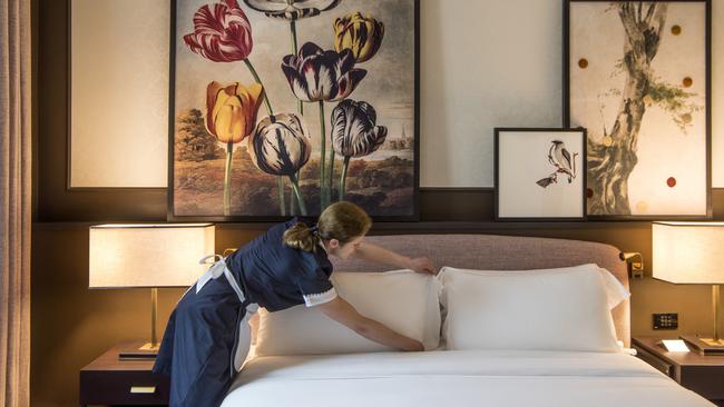 Putting the finishing touches on a guestroom at Hotel Vilon in Rome.