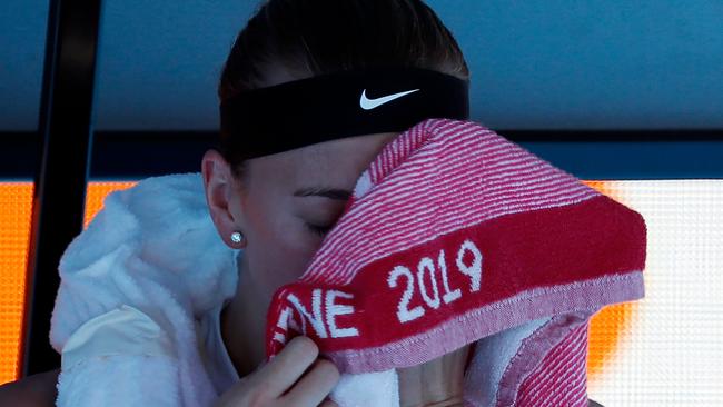 Czech Republic's Petra Kvitova uses an ice towel during a break in her women's singles semi-final match against Danielle Collins. Picture: David Gray/AFP