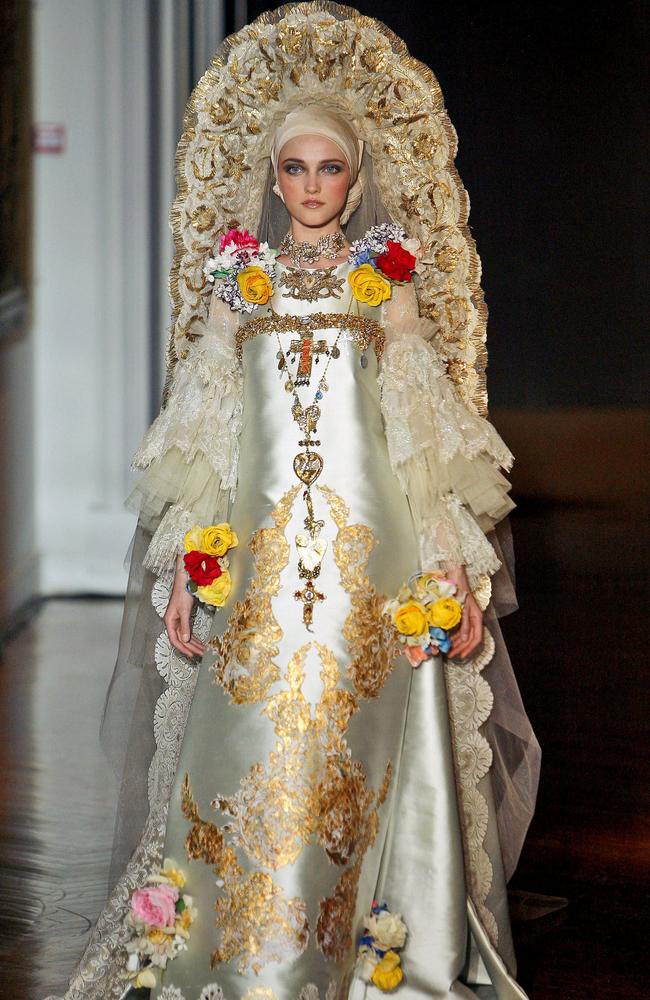 Fashion designers such as Christian Lacroix favour religious iconography in their runway shows. Picture: AP Photo/Jacques Brinon.