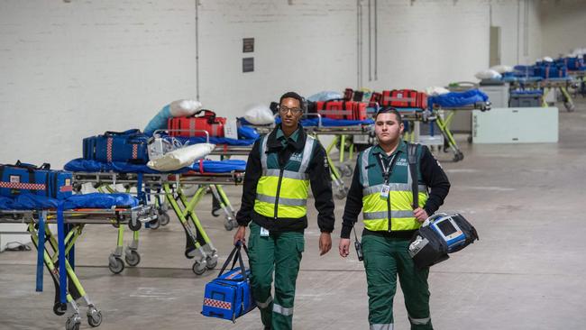 Thomas Marcus and Zak Landers sets up an Urgent Care Centre at Melbourne Showgrounds Picture: Tony Gough