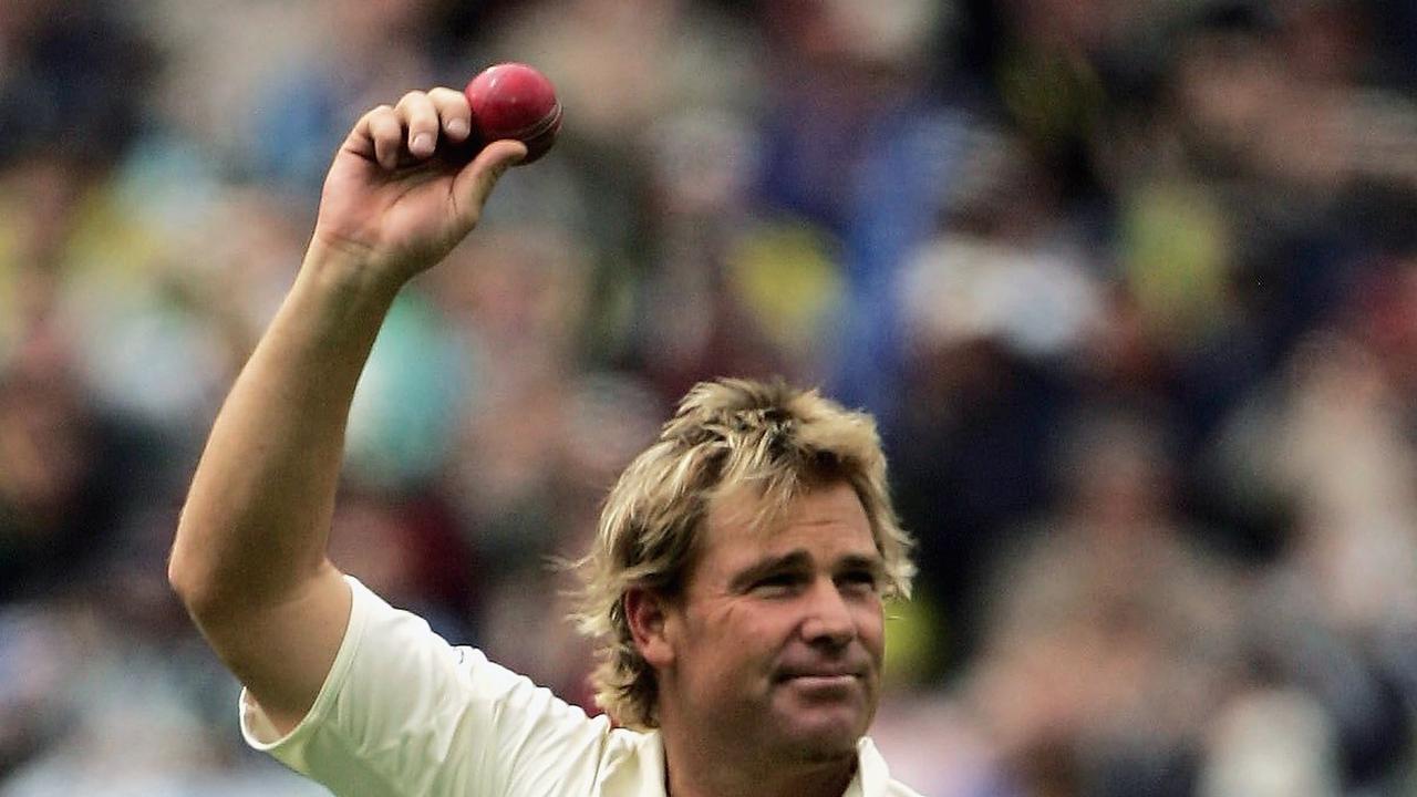 Warne celebrates his 700th Test wicket, the first man to reach the milestone.