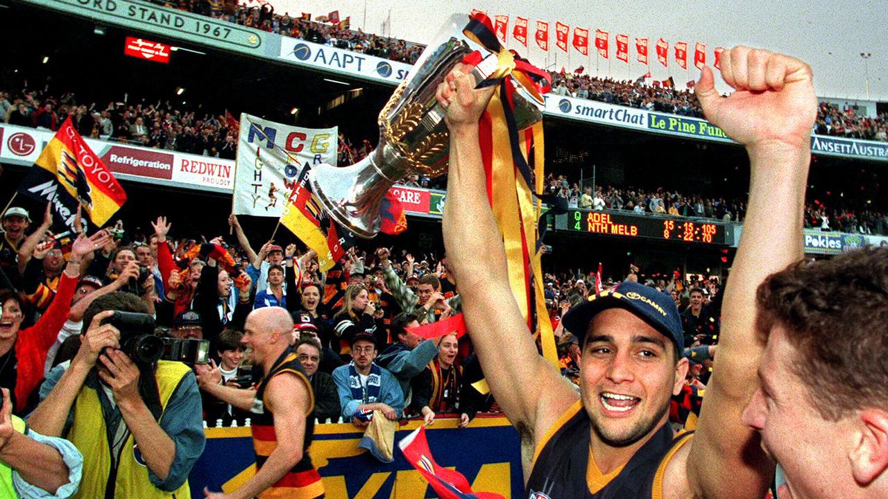 Andrew McLeod celebrates with his teammates after the 1998 Grand Final. Picture: Titus Ray