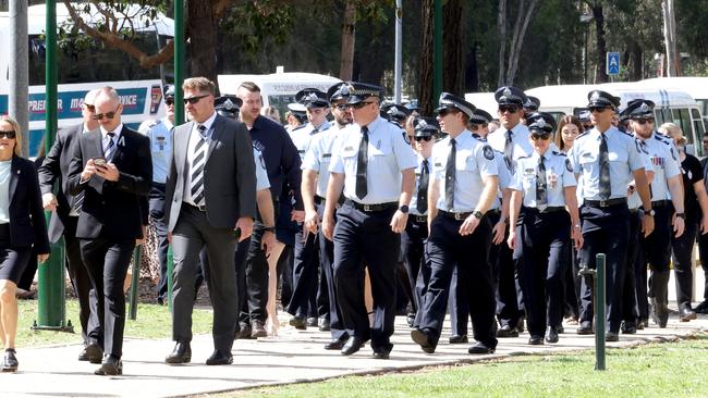 Police arrive for the memorial service with full police honours for fallen colleagues Constable Rachel McCrow and Constable Matthew Arnold, Brisbane Entertainment Centre. Picture: Steve Pohlner