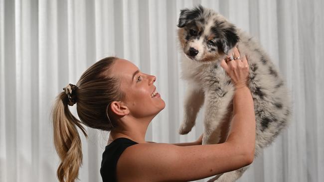 Georgia McConnell with her nine-week-old Australian Shepherd, Eddy. Picture: Keryn Stevens