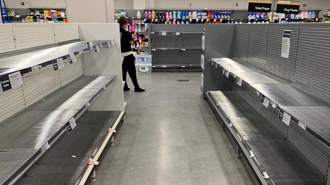 Empty shelves of toilet paper are seen at Woolworths Town Hall in Sydney. Picture: AAP Image/Bianca De Marchi.