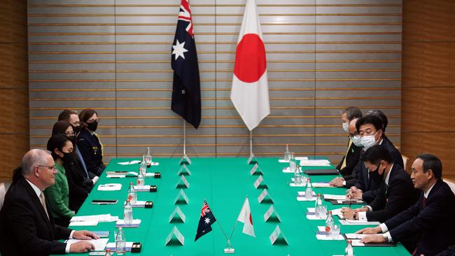 Prime Minister Scott Morrison and Japan's Prime Minister Yoshihide Suga attend a bilateral meeting at Suga's official residence in Tokyo. Picture: AFP