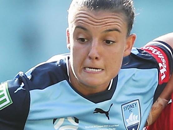 SYDNEY, AUSTRALIA - FEBRUARY 18:  Chloe Logarzo of Sydney FC is challenged by Aivi Luik of Melbourne City during the W-League Grand Final match between Sydney FC and Melbourne City FC at Allianz Stadium on February 18, 2018 in Sydney, Australia.  (Photo by Matt King/Getty Images)