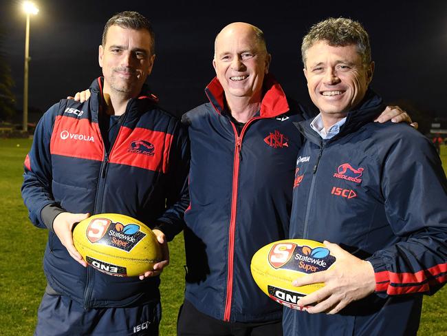 28/08/19 - Norwood coach Jarrod Cotton and ceo James Fantasia with Phil Smyth (centre) at the Parade.Picture: Tom Huntley