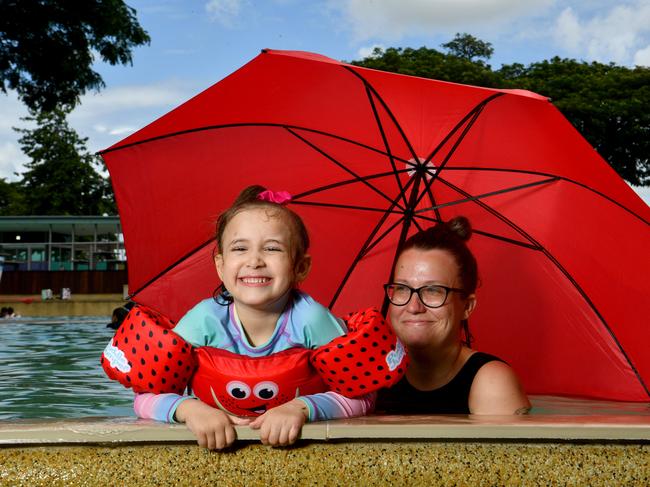 Katrina Weston with Ngahuia Tamou, 5, cool off at Riverway despite the threat of rain. Picture: Evan Morgan